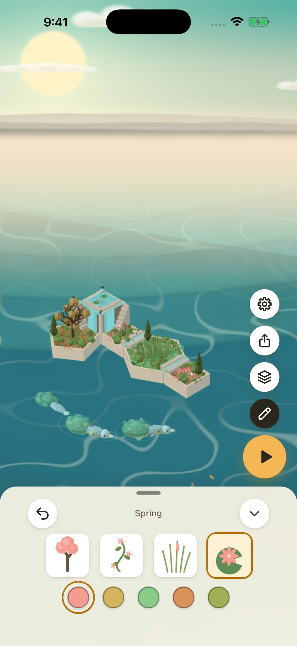 Composing on iPhone: a few planted tiles on the water, with the plant and note pieces open at the bottom of the screen.